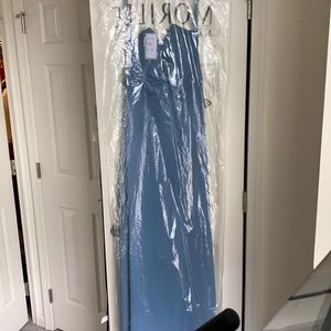 Good condition. No tears or stains. Worn once. Slate blue.